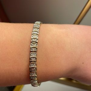 Gold plated and silver link bracelet.